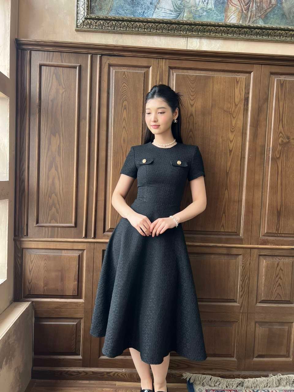 Miyu Dress by Tiffany Studio — black, front view with a flared skirt