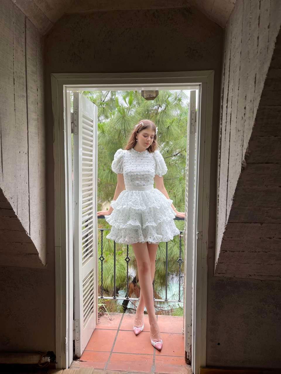 Charlise Dress Blue Edition by Tiffany Studio — white, full length in a doorway